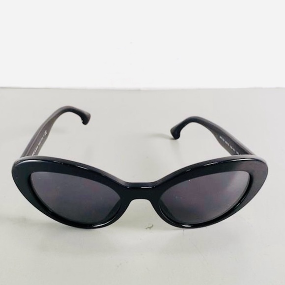 Prada Women's SPR15Q Oval Cat-eye Sunglasses, Black - Picture 6 of 10